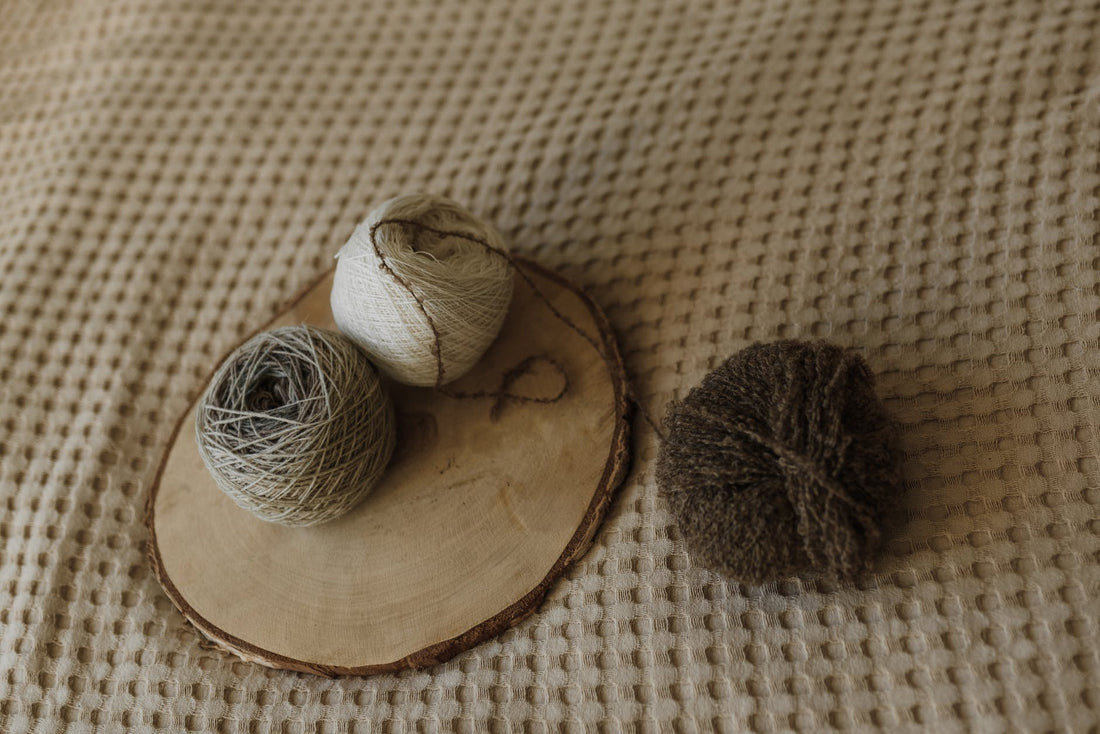 brown yarn on brown wooden round plate