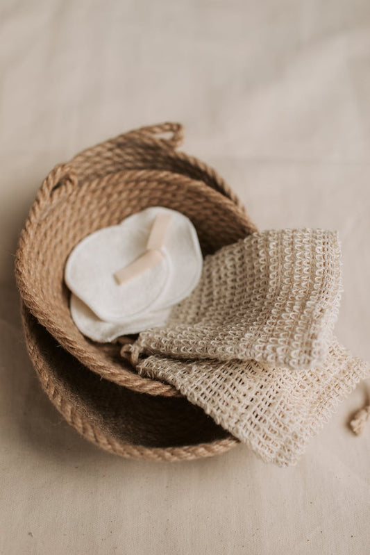 hemp washcloth in braided jute basket